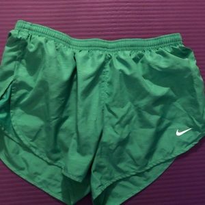 Green Nike shorts